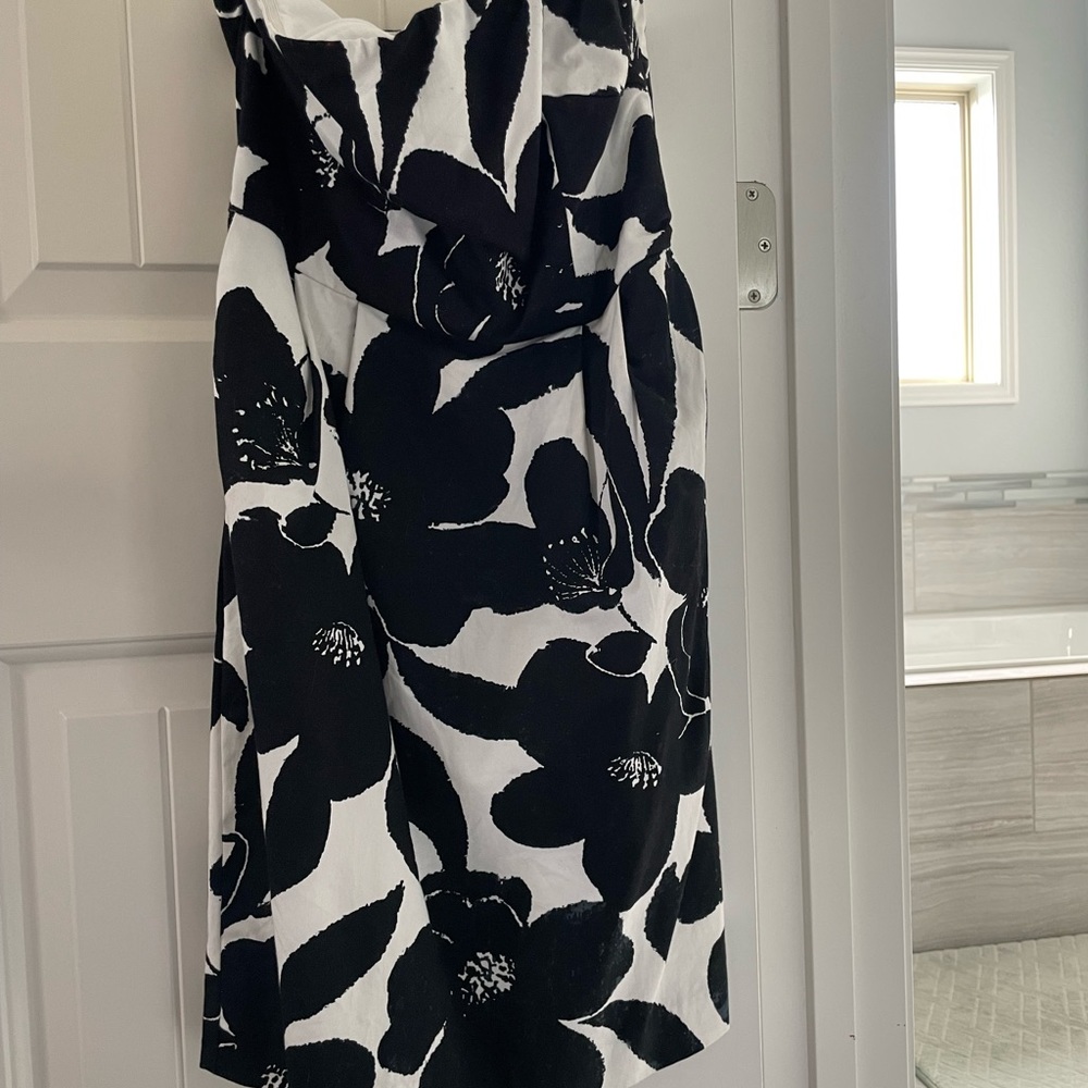 Strapless Express dress with small slit in the back.